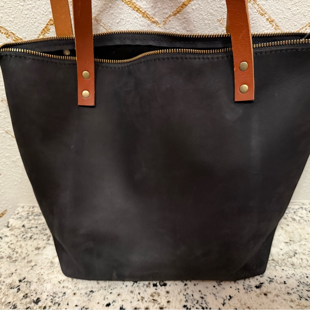 Chic Black Leather Tote with Tan Handles
